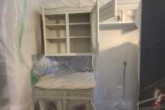Interior kitchen cabinet painting  preparation and covering by The Painting Group and Renovation